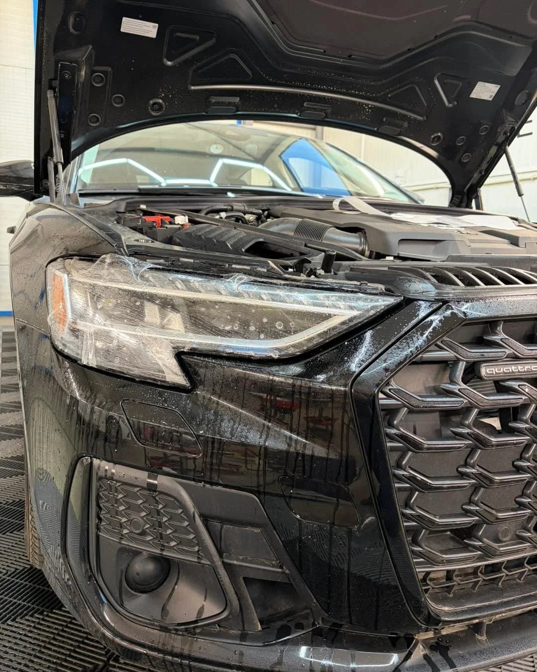 Audi A8 с PPF фолио върху преден детайл и фар в студиото на SRV